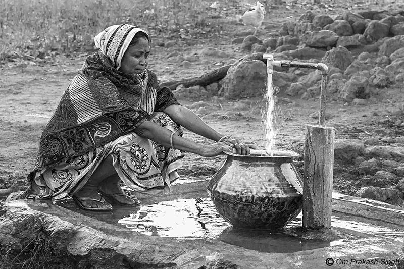 Optimizing traditional drinking water sources for accelerating change - Collecting water for domestic use from a public standpoint in Jiyatpani Tola, village Dumarpahar, district Dumka, Jharkhand